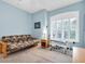 Multi-purpose bonus room with a futon and weight equipment at 435 Westwinds Drive, Palm Harbor, FL 34683