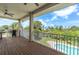 Spacious deck overlooking the pool and backyard at 435 Westwinds Drive, Palm Harbor, FL 34683