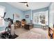 Bright home office with built-in shelving and plenty of natural light at 435 Westwinds Drive, Palm Harbor, FL 34683