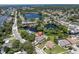 Aerial view highlighting home's canal-front position in a residential area at 435 Westwinds Drive, Palm Harbor, FL 34683