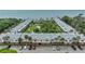 Aerial view of waterfront community with pool and parking at 650 Pinellas Point S Dr # 106, St Petersburg, FL 33705