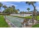 Community shuffleboard court with benches and landscaping at 650 Pinellas Point S Dr # 106, St Petersburg, FL 33705