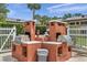 Community grills for outdoor entertaining at 650 Pinellas Point S Dr # 106, St Petersburg, FL 33705