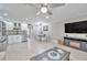 Open living space with kitchen, dining, and living areas at 650 Pinellas Point S Dr # 106, St Petersburg, FL 33705
