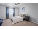 Bedroom with a full-size bed, nightstand, and ceiling fan at 200 Country Club Dr # 1004, Largo, FL 33771