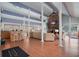 Community room showcasing a kitchen, seating area, and high ceilings at 200 Country Club Dr # 1004, Largo, FL 33771
