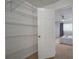 Well-organized closet with wire shelving offers convenient storage at 200 Country Club Dr # 1004, Largo, FL 33771