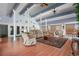 Spacious community room with vaulted ceilings, fireplace, and seating area at 200 Country Club Dr # 1004, Largo, FL 33771