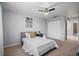 Bedroom with a twin-size bed, nightstand and ceiling fan at 200 Country Club Dr # 1004, Largo, FL 33771