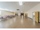 Expansive view of a well-lit ballroom, showcasing the stage and additional seating areas at 2410 Franciscan Dr # 94, Clearwater, FL 33763