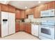 Well-equipped kitchen, featuring ample cabinetry and modern appliances at 13500 Gulf Blvd # 605, Madeira Beach, FL 33708