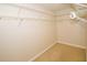 Walk-in closet with wire shelving for ample storage at 903 San Carlos Ne Ave, St Petersburg, FL 33702