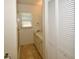 Clean bathroom with shower and built-in shelving at 903 San Carlos Ne Ave, St Petersburg, FL 33702