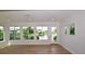 Bright sunroom with lake views and access to the backyard at 903 San Carlos Ne Ave, St Petersburg, FL 33702