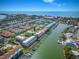 Wide aerial view of the property and surrounding area at 320 Windrush Blvd # 4, Indian Rocks Beach, FL 33785