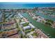 Aerial view showcasing the property's waterfront location at 320 Windrush Blvd # 4, Indian Rocks Beach, FL 33785