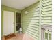 Front entrance with white door and tiled flooring at 320 Windrush Blvd # 4, Indian Rocks Beach, FL 33785