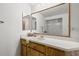 Bathroom with a vanity, large mirror, and shower at 320 Windrush Blvd # 4, Indian Rocks Beach, FL 33785