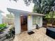 Workshop/Storage shed with open door, showing interior storage at 2827 11Th N Ave, St Petersburg, FL 33713