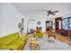 Spacious living area featuring hardwood floors, a ceiling fan, and comfortable seating at 2827 11Th N Ave, St Petersburg, FL 33713