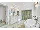 Spa-like bathroom with double vanity, soaking tub, and walk-in shower at 2827 11Th N Ave, St Petersburg, FL 33713