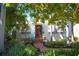 Charming bungalow with lush landscaping and brick pathway at 2827 11Th N Ave, St Petersburg, FL 33713