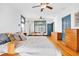 Spacious main bedroom with a king-size bed, built-in cabinets, and hardwood floors at 2827 11Th N Ave, St Petersburg, FL 33713