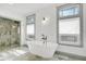 Relaxing bathroom featuring a freestanding tub and walk-in shower at 2827 11Th N Ave, St Petersburg, FL 33713