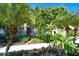 Home with tropical landscaping and walkway at 2827 11Th N Ave, St Petersburg, FL 33713