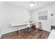 Home office featuring a white desk and wood floors at 5534 Atlantic N Ave, St Petersburg, FL 33703