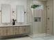 Spa-like bathroom with double vanity and large shower at 6366 Central Ave # Sp2-2, St Petersburg, FL 33707