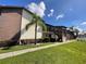 Two story building with walkway and landscaping at 5521 Bay Blvd # 201, Port Richey, FL 34668