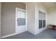 Inviting condo entry with screen door and window at 11520 Shipwatch Dr # 1386, Largo, FL 33774