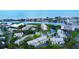 Aerial view of community highlighting the condo's location near water and amenities at 11520 Shipwatch Dr # 1386, Largo, FL 33774