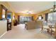 Spacious living room with sofa and dining area at 11520 Shipwatch Dr # 1386, Largo, FL 33774