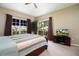 Comfortable main bedroom with sliding glass door at 11520 Shipwatch Dr # 1386, Largo, FL 33774