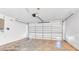 Attached garage with ample space for storage and parking at 5204 New Brittany Ln, Zephyrhills, FL 33541