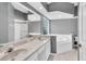 Spacious bathroom with double vanity, soaking tub, and separate shower at 5204 New Brittany Ln, Zephyrhills, FL 33541