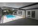 Inviting screened pool area, perfect for relaxation and entertainment at 5204 New Brittany Ln, Zephyrhills, FL 33541