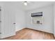 Bright bedroom with hardwood floors and ample closet space at 5204 New Brittany Ln, Zephyrhills, FL 33541