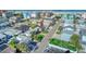 Aerial view of a single-Gathering home near the beach in a residential area at 142 Beach Ave, Redington Shores, FL 33708