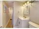 Clean bathroom with white vanity and a shower at 142 Beach Ave, Redington Shores, FL 33708