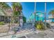 Convenient beach access path with public beach rules signage at 142 Beach Ave, Redington Shores, FL 33708