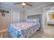 Bedroom with a full-size bed and coastal bedding at 142 Beach Ave, Redington Shores, FL 33708
