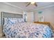 Beach-themed bedroom with a comfortable bed and plenty of light at 142 Beach Ave, Redington Shores, FL 33708