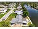 Aerial view of the house and surrounding neighborhood at 2248 Society Dr, Holiday, FL 34691