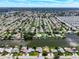 Wide aerial view of waterfront homes and community at 2248 Society Dr, Holiday, FL 34691