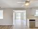 Dining area with view of canal from sliding glass doors at 2248 Society Dr, Holiday, FL 34691