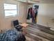 Bedroom with closet and wood-look flooring at 2528 Almond Dr, Holiday, FL 34691