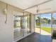 Bright screened-in room with water views at 2248 Society Dr, Holiday, FL 34691